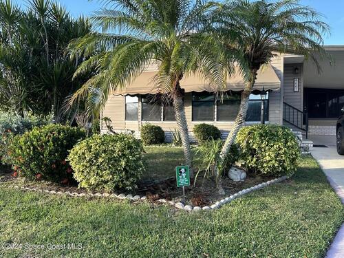 602 Dolphin Circle, Barefoot Bay, FL 32976