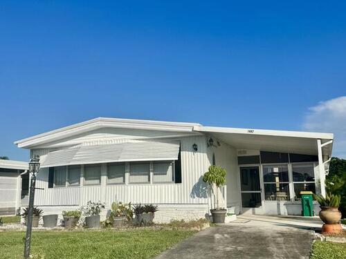 1447 Barefoot Circle, Barefoot Bay, FL 32976