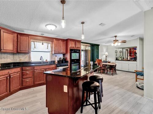 729 Gladiolus Drive, Barefoot Bay, FL 32976