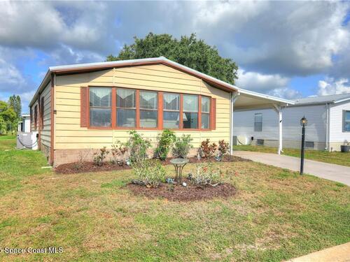 705 Hyacinth Circle, Barefoot Bay, FL 32976