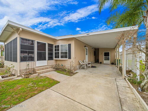 1103 Sabal Palm Lane, Barefoot Bay, FL 32976